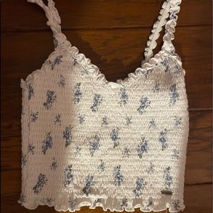Hollister White with blue flowers tank top. Size: M